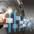 businessman hand touch virtual graph,chart, diagram
